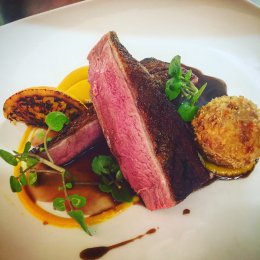 Duck with orange puree, confit leg and potato croquette at The Sooty Olive | Courtesy The Sooty Olive